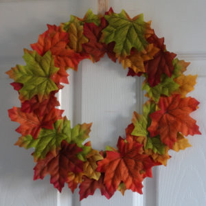 fall leaf weath on a paper plate 